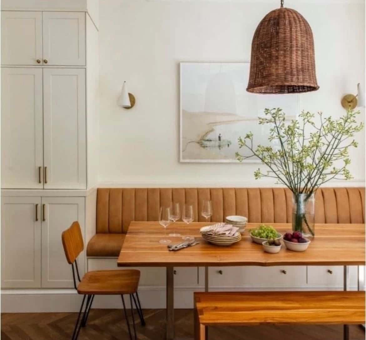 A channel-stitched leather banquette in a finished dining fit-out