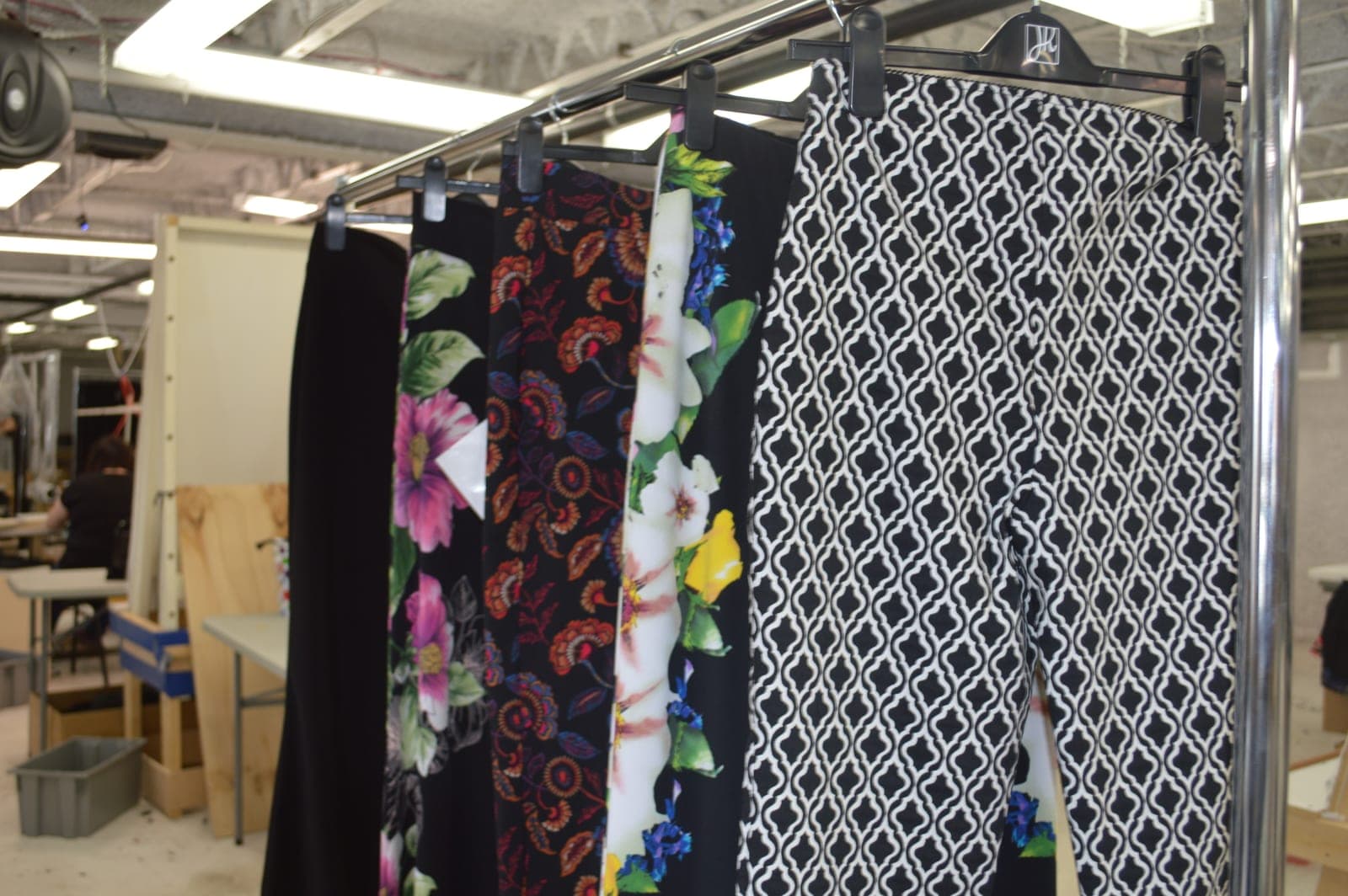 A finished production run hung in printed and plain fabrics